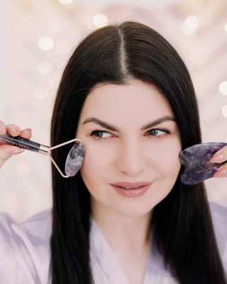 Veido masažuoklis su ametisto akmeniu harmonija, raminančiu ir raminančiu voleliu